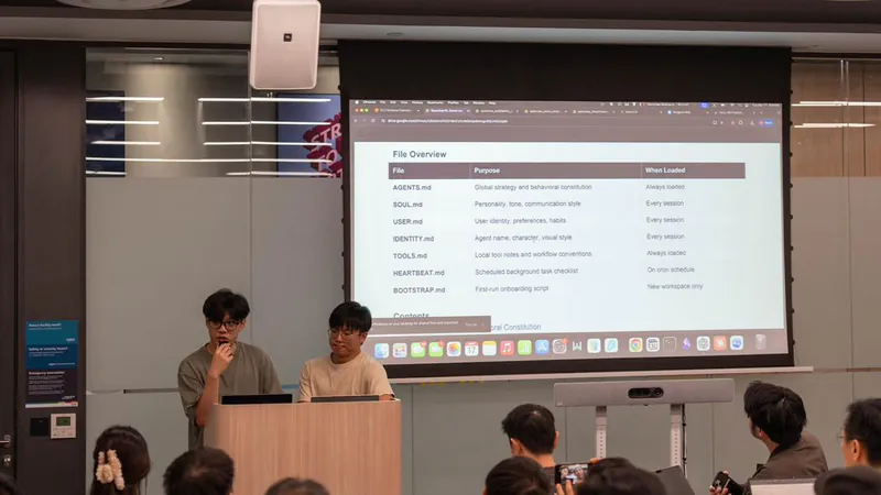 Two presenters at a lectern walk an audience through OpenClaw